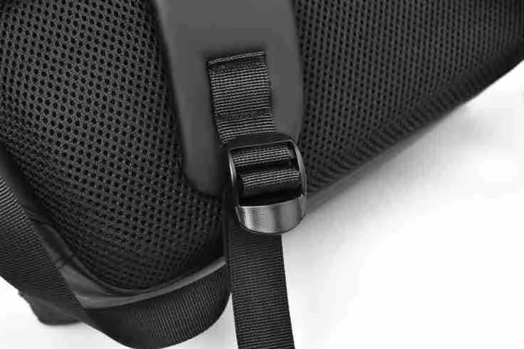 Waterproof PU leather laptop backpack in black, blue or grey with large capacity and laptop compartment
