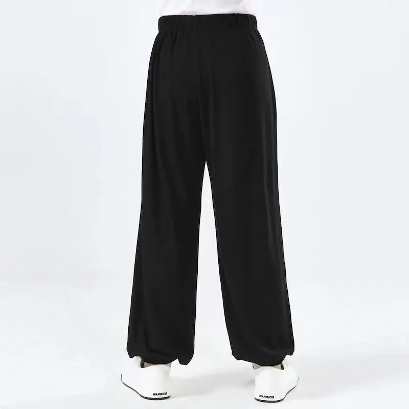 Children's black high elasticity practice pants for Sanda martial arts training with stretchy fabric