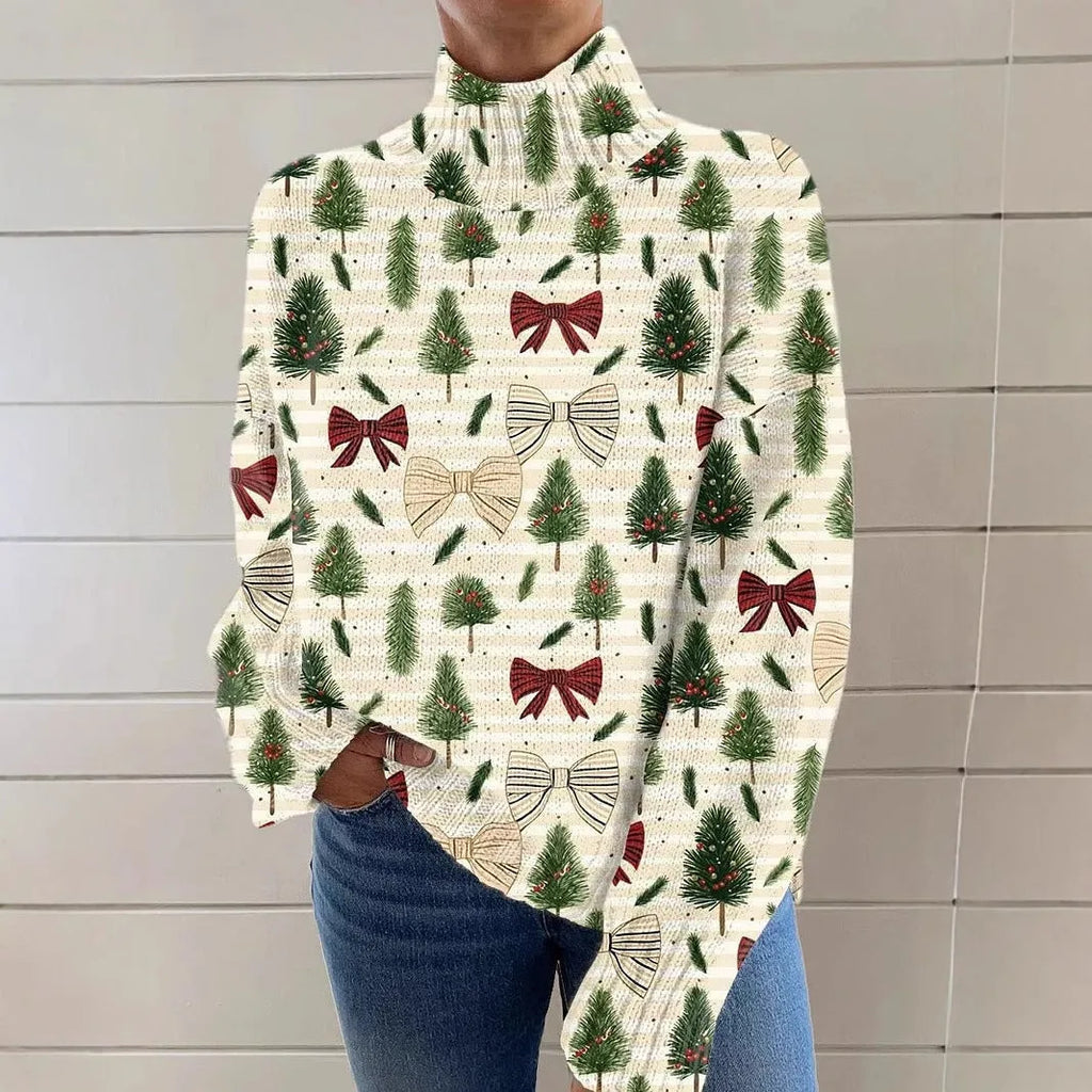 A woman's loose-fit Christmas sweater with a painted festive print, a turtleneck, and long sleeves in a soft macaron colour.
