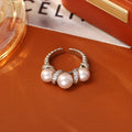 Open-end ring with round pearl element in grey colour, real gold plated copper base, unisex geometric style