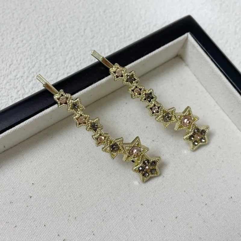 Gold Korean style rhinestone barrette with five-pointed star decoration and side clip for bangs