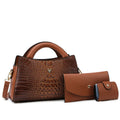 Women's black crocodile pattern PU crossbody handbag showing zip compartments and single shoulder strap.