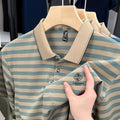 Man wearing a red mosaic stripe short-sleeve casual shirt made from polyester.