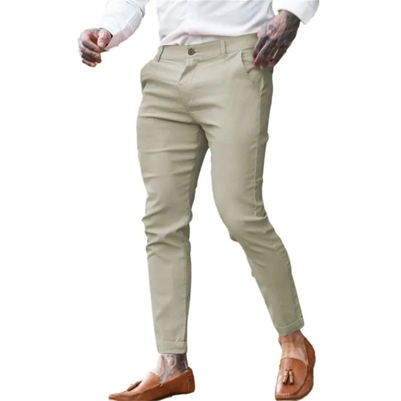 Men's slim fit pencil trousers in stretch cotton twill fabric showing mid waist and zip fly design