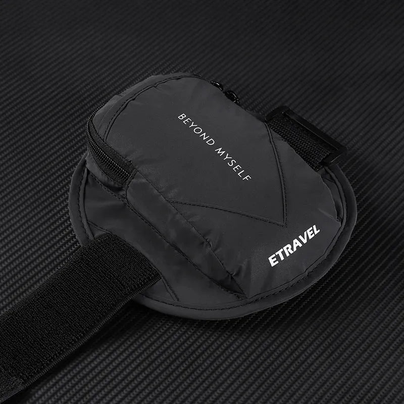 Reflective black running arm bag with adjustable strap, holding a mobile phone, shown on a runner's arm.