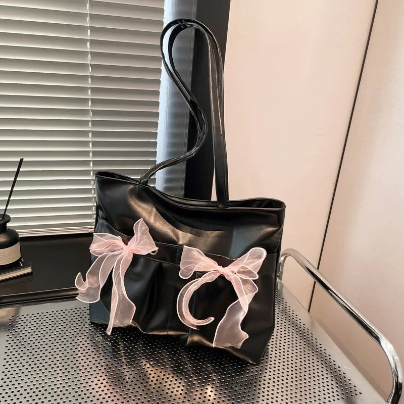 College style bow tote bag in PU leather with large capacity and internal zipper pocket organisation