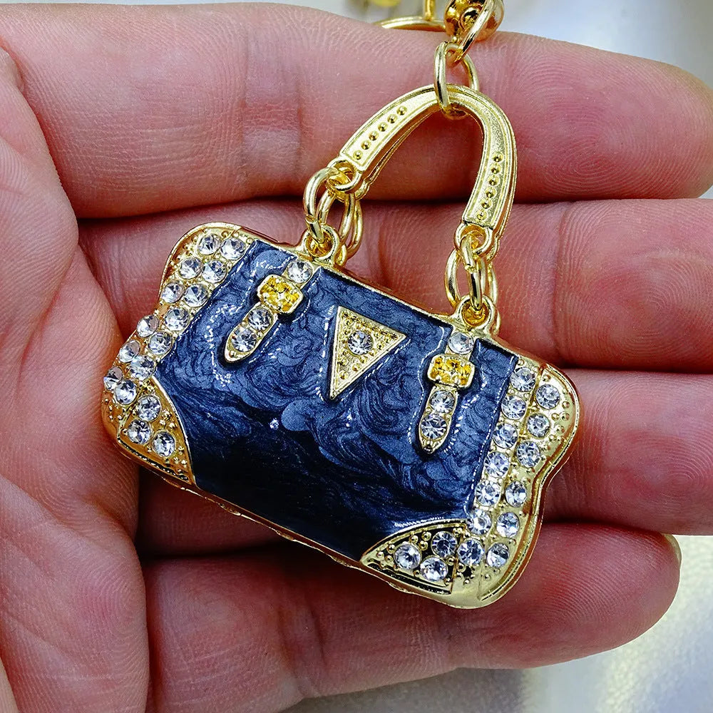 Alloy pendant keychain with enamel diamond cloud pattern in gold colour on keyring