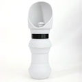 A folded flat and an unfolded silicone pet water cup in various colours including pink, black, and pineapple designs.