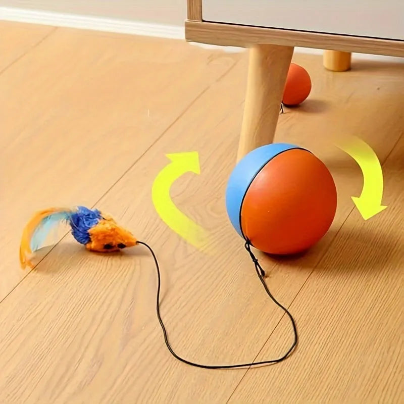 Interactive blue and orange cat toy ball with plush mouse attachment, shown next to a ruler for scale.