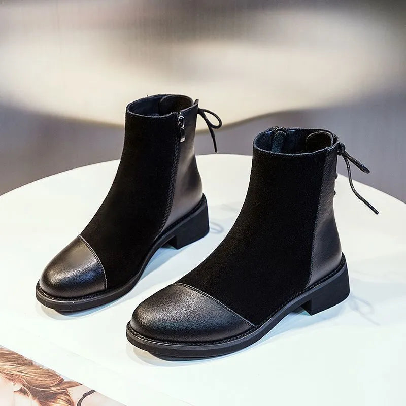 Women's black knee-high Martin boots with side zipper and round toe