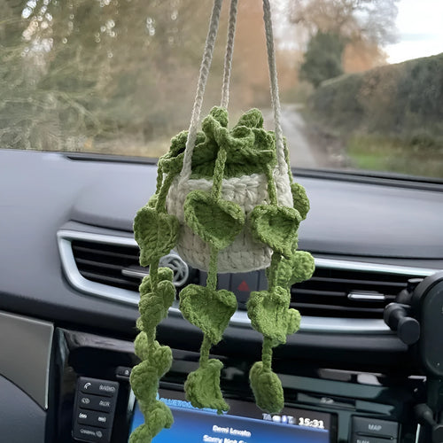 Green and white fish-scale style knitted wool car hanging planter with 8cm base and long white cord.