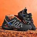 Men's synthetic leather casual running trainers with mesh lining in black and white colour