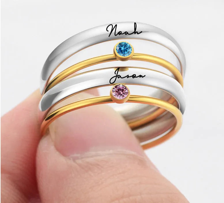 Engraved titanium steel ring with December birthstone colour design on a geometric band.