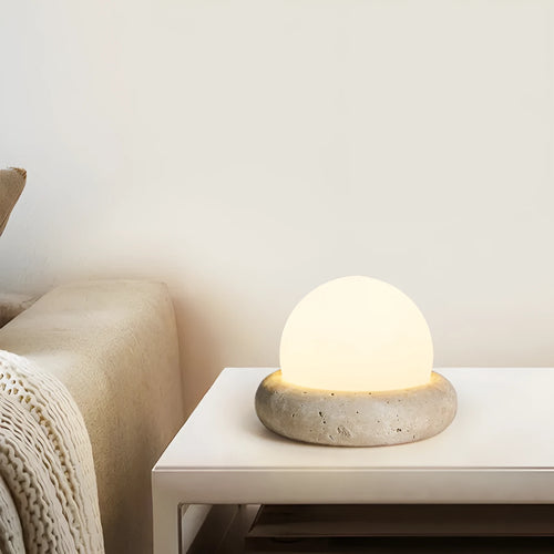 Cream modern bedside night light with remote control on wooden table