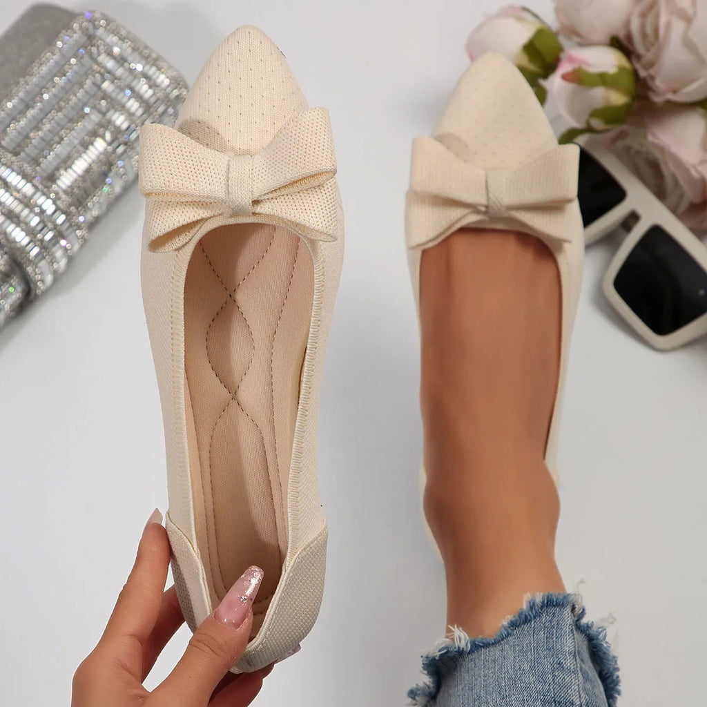 Women's pointed knitted bow shallow mouth flat pumps in black with bow detail and rubber sole