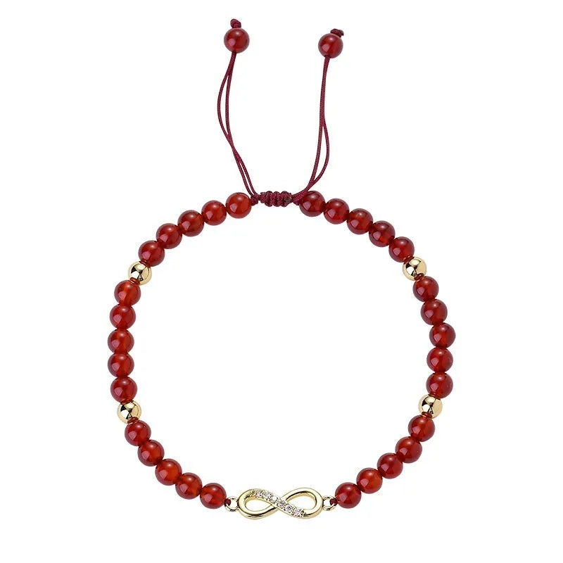 Hand-woven natural red agate bracelet showing diamond-shaped beads in ethnic woven pattern