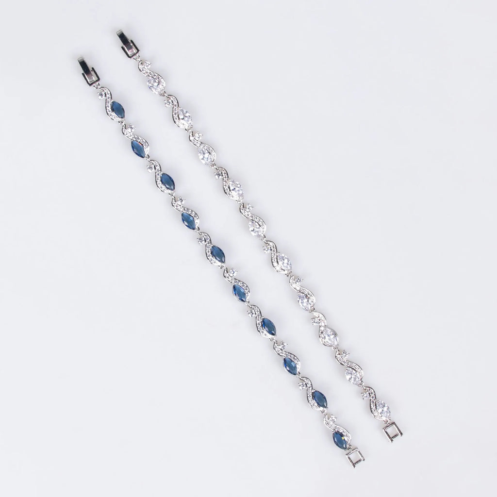 Zircon line bracelet in copper with geometric inlaid design, shown in blue or white for women