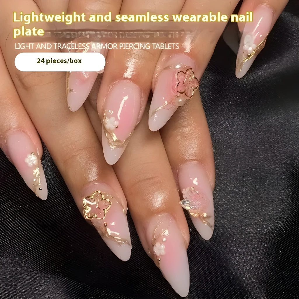 Gold silk butterfly nail tips with flower patterns and gradient gilding in medium drop shape