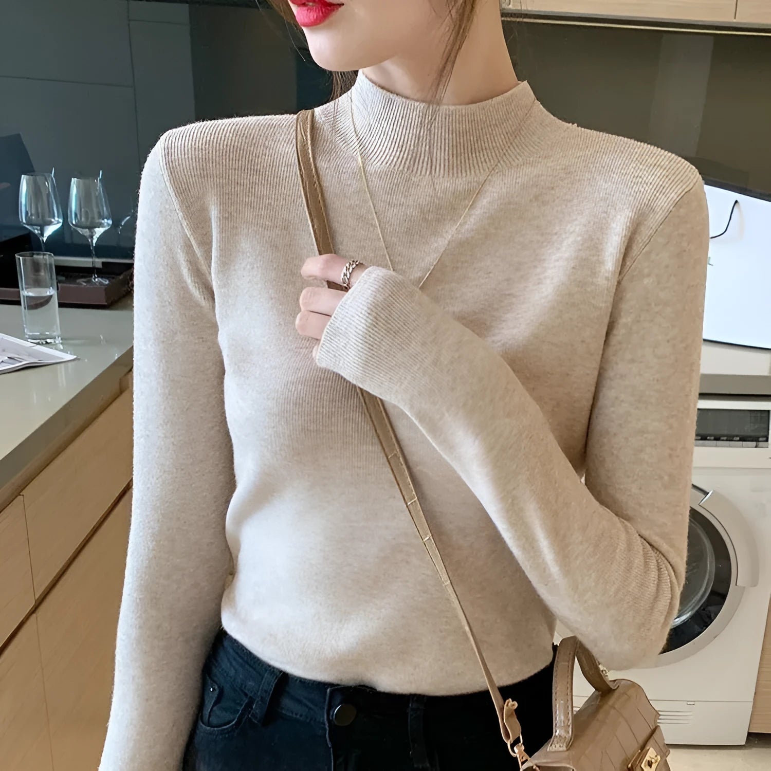 Slim fit knitted viscose shirt in a neutral colour showing long sleeves and pullover design.