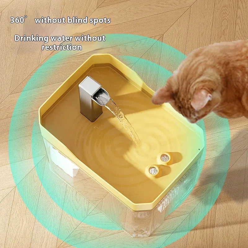 Automatic cat water fountain with filter in transparent plastic, showing water flow.