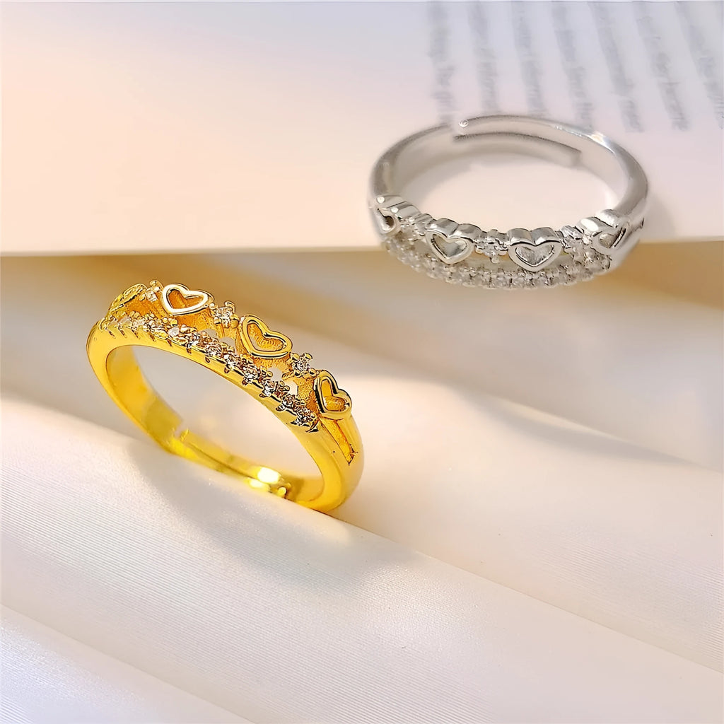 Adjustable open ring in gold or silver with double layer heart, crown and star design on copper band