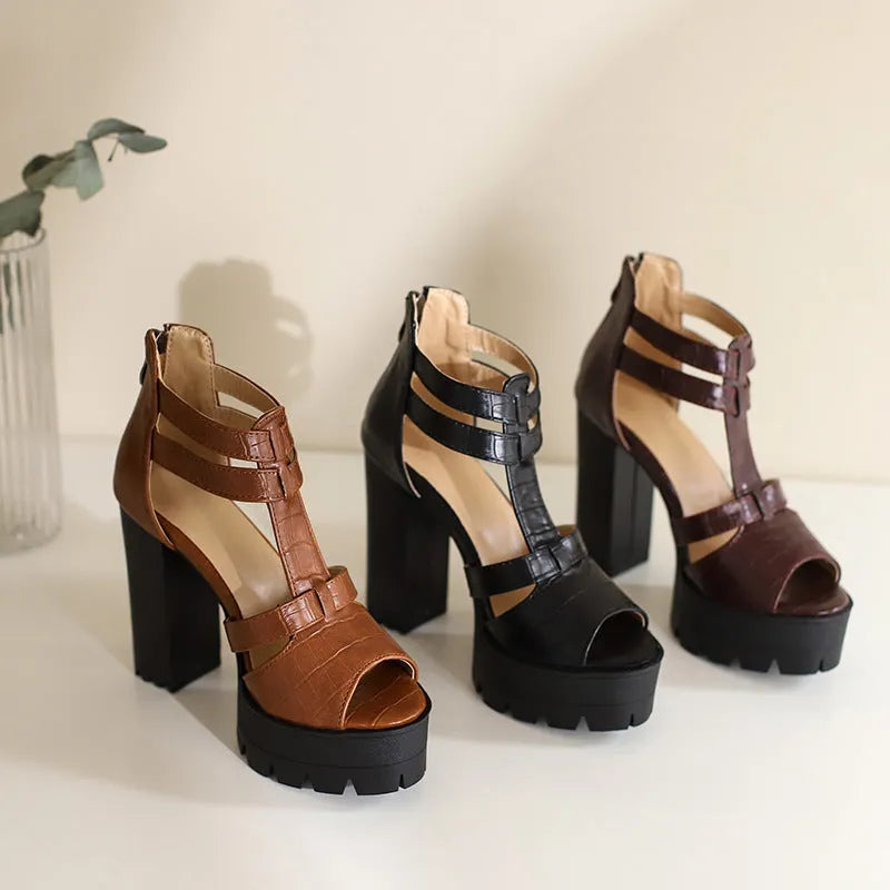 Women's black platform high heel sandals with round toe and back zip fastening.