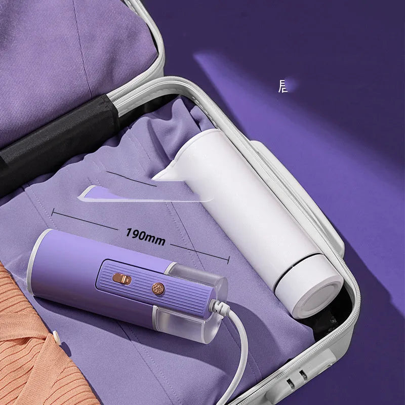 Portable handheld garment steamer in grey lotus root purple colour with foldable design