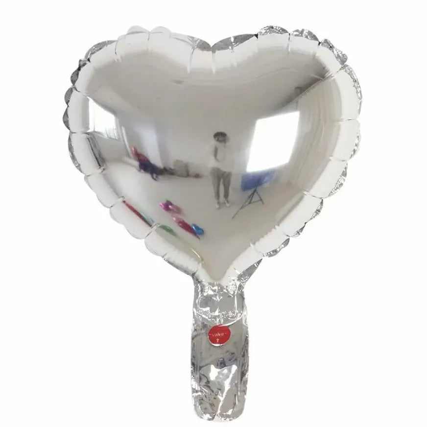 Set of five shiny metallic peach heart-shaped aluminium balloons in rose red colour.