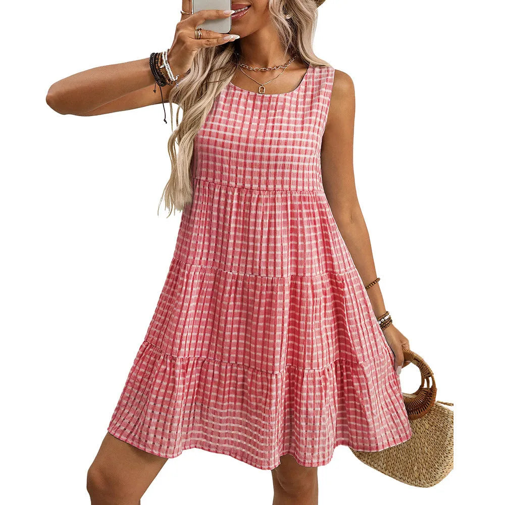 Women's loose sleeveless plaid dress with an oversized swing skirt and high waist.