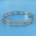 Hollow women's bracelet with four-leaf clover charm containing inlaid AAA zircon gemstones