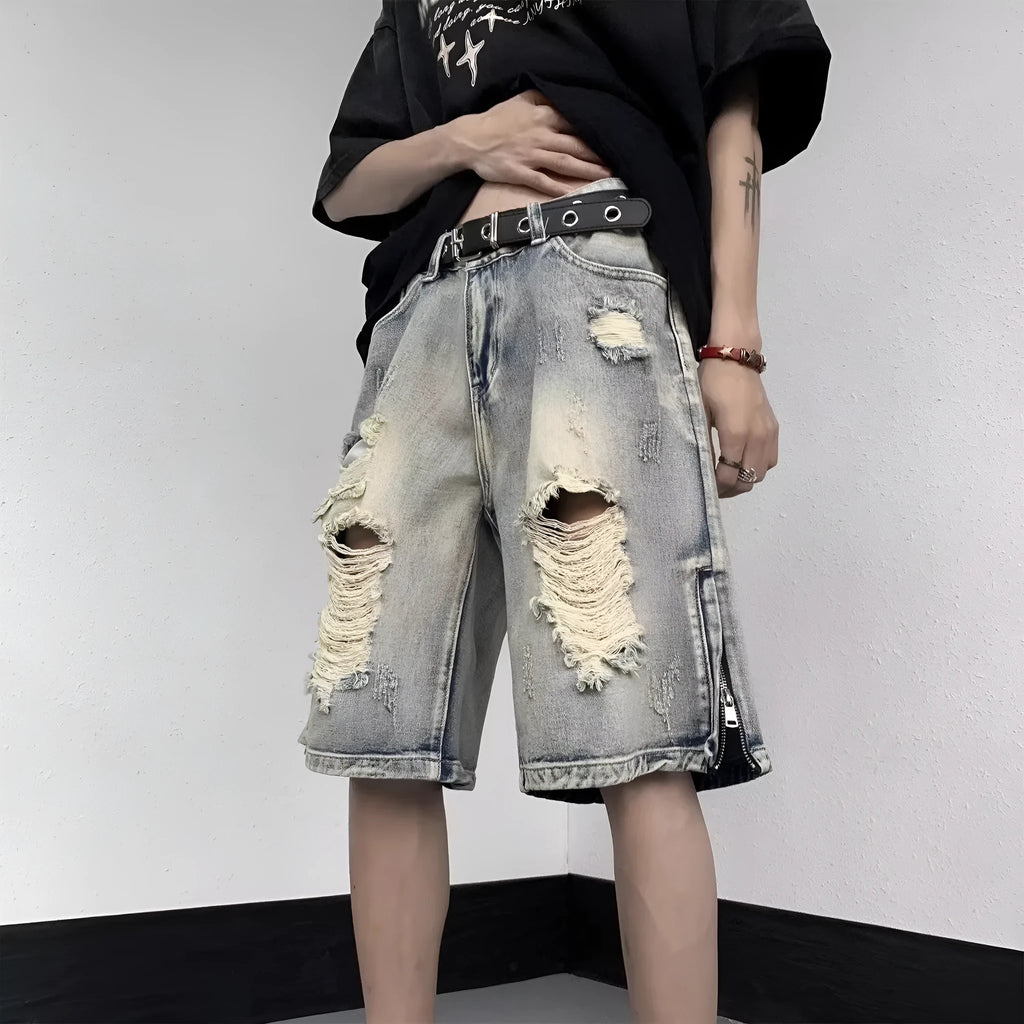 Blue retro style wide leg denim shorts with tattered detailing and loose fit