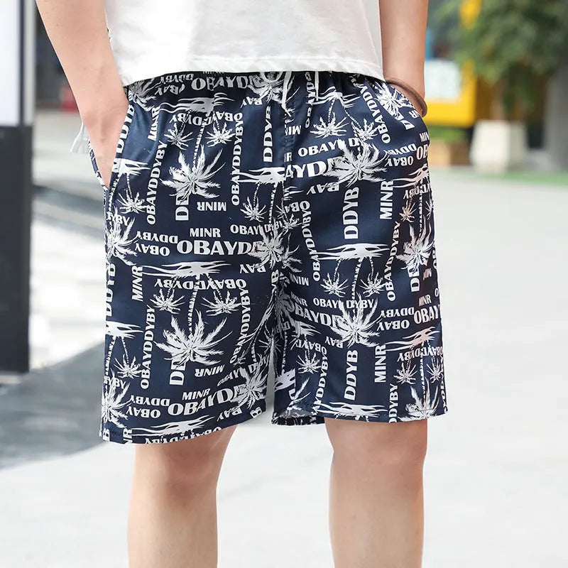 Men's floral printed swimming trunks in polyester with five-point design for beach and pool use