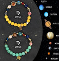 Two natural stone bead bracelets with zodiac symbols on a table, showing adjustable silver zinc alloy clasp.