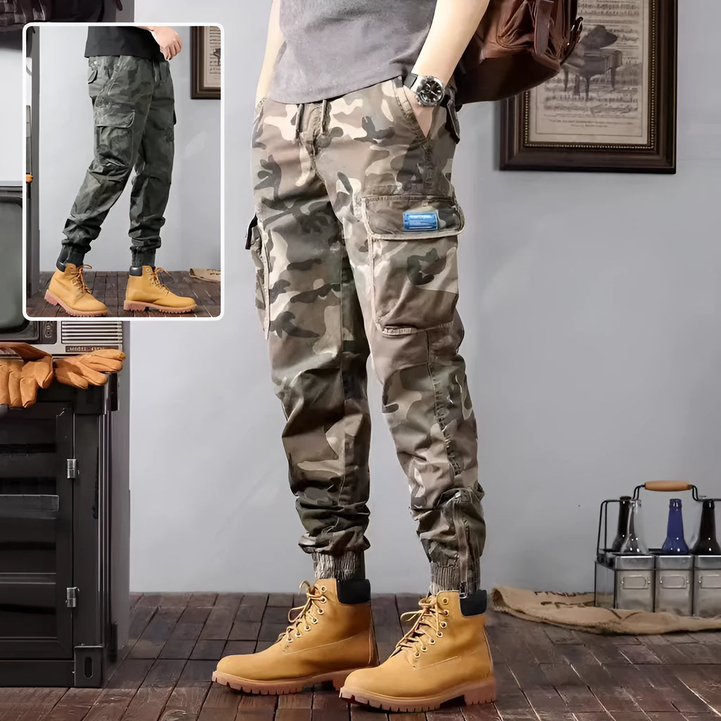 Men's camouflage cargo pants in Army Green, loose tapered fit with pockets, polyester cotton.