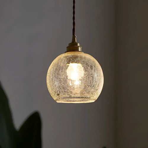 Brass and glass ball chandelier with copper body and clear spherical shade, shown in diamond colour.