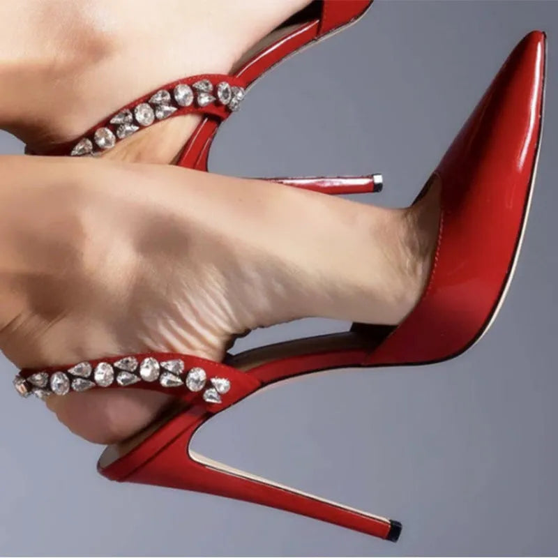 Women's pointed toe high heel sandals with rhinestone decoration on the side, in patent leather.