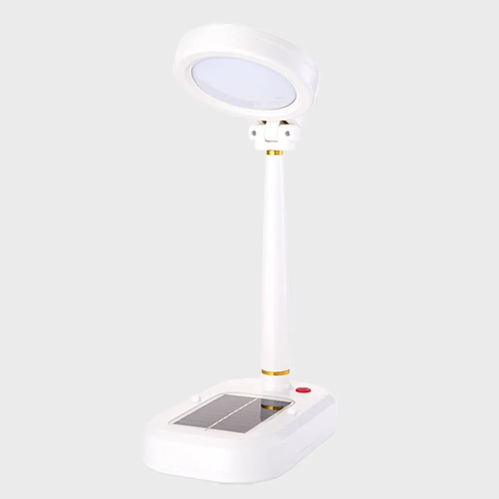Ivory white solar-powered table fan with integrated LED study lamp on a desk.