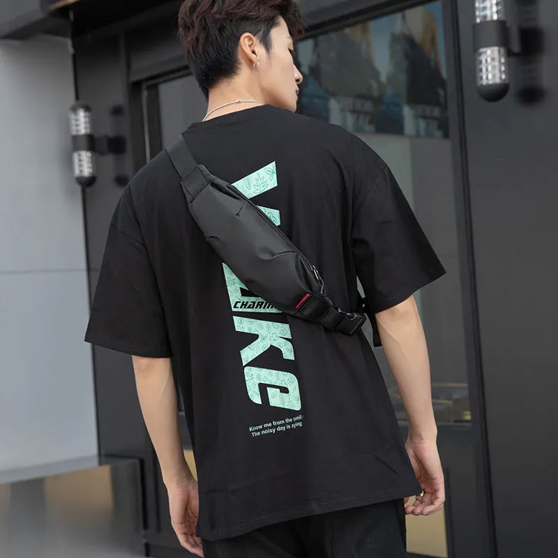Men's black oxford cloth crossbody waist bag with internal organisation pockets