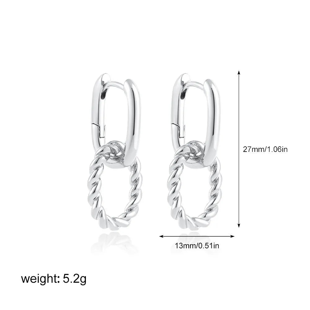 Copper geometric square double ring twist ear clip earrings on display