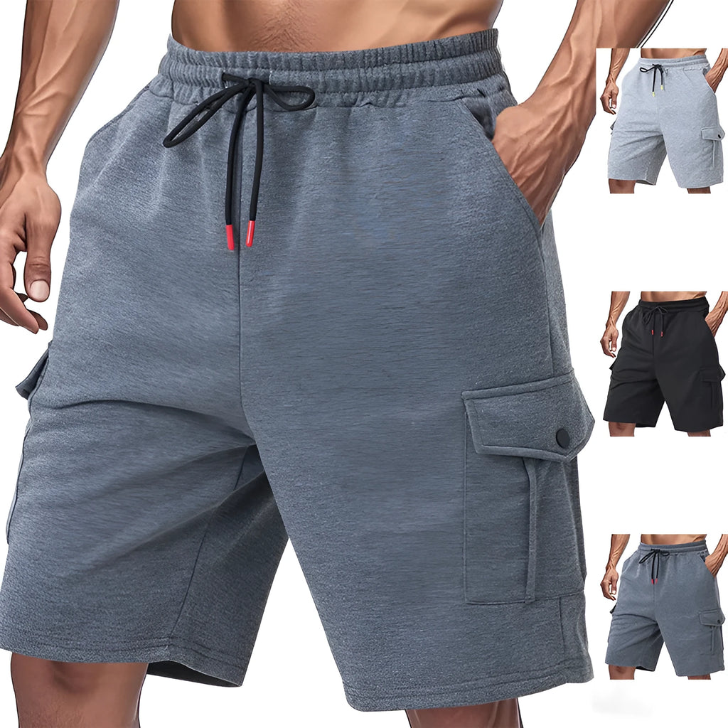 Loose grey terry fabric cargo shorts with multiple pockets on a neutral background