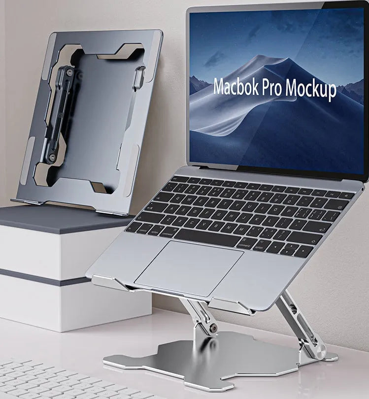 Grey aluminium adjustable laptop stand holding a silver laptop, showing its hollow design and folded position.