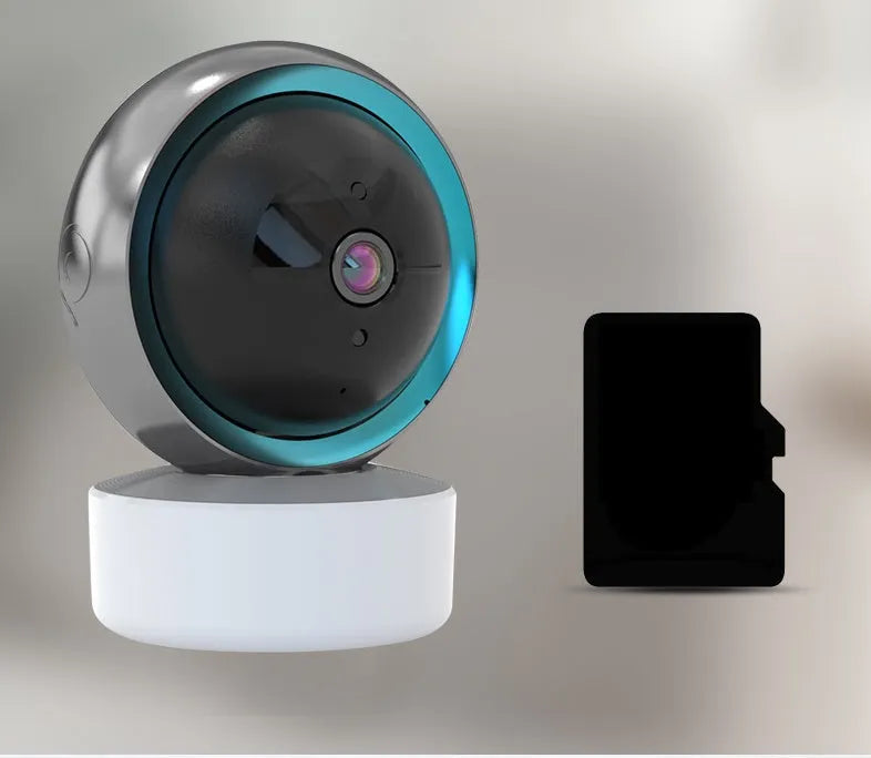 White indoor WiFi security camera with 360-degree rotation on a stand.