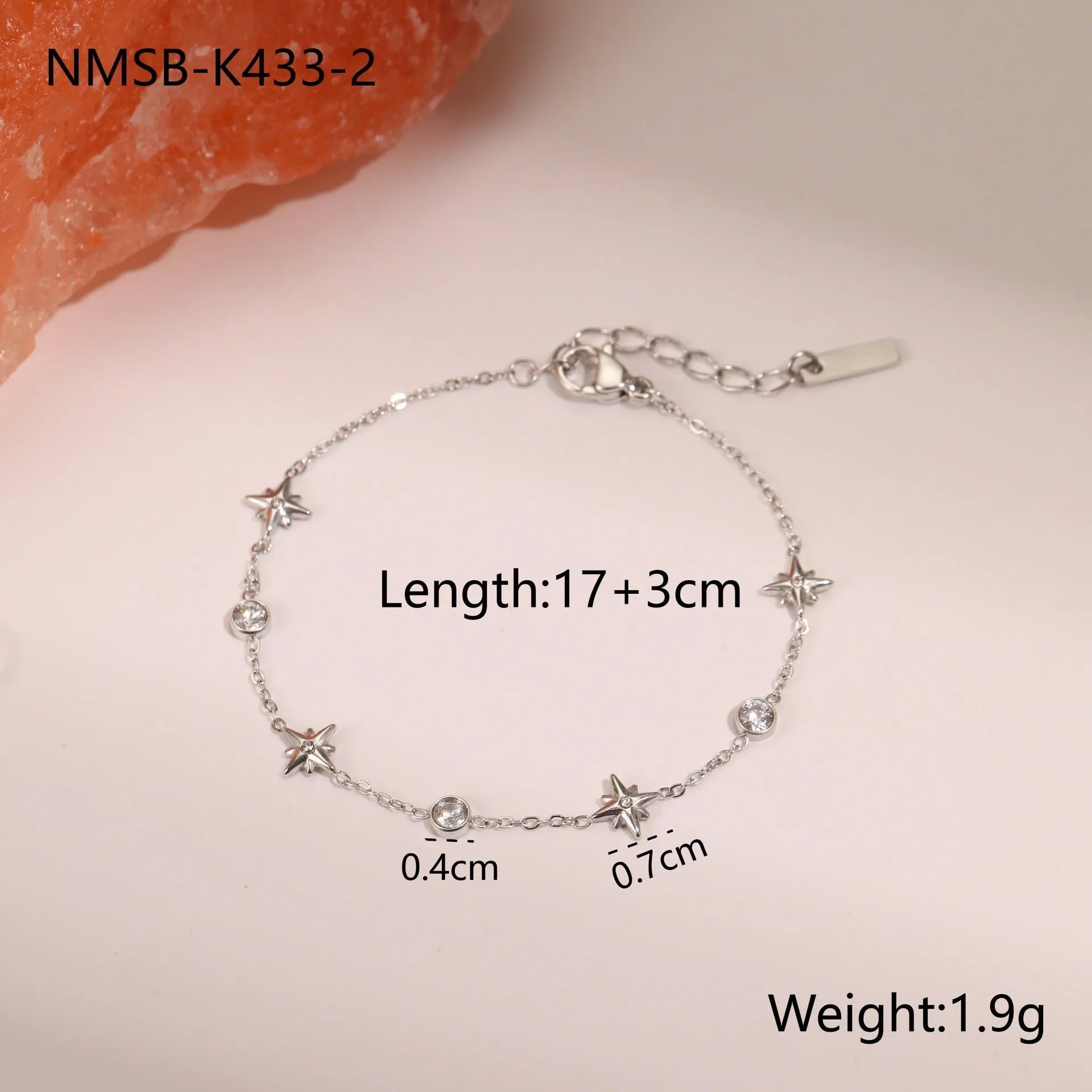 Women's stainless steel bracelet with 18K gold plating and geometric zircon star pendant