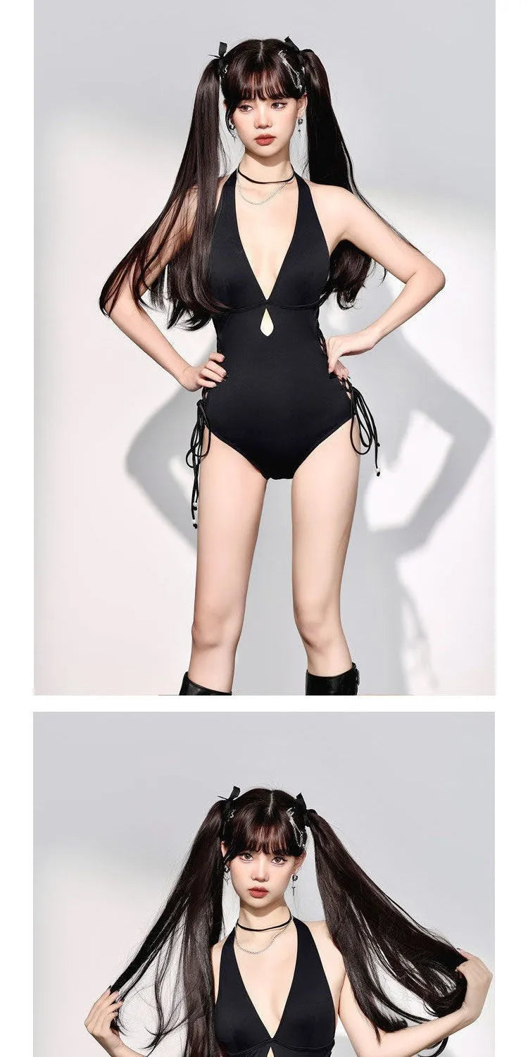 Black women's one-piece swimsuit with V-neck and hollow strap detail.