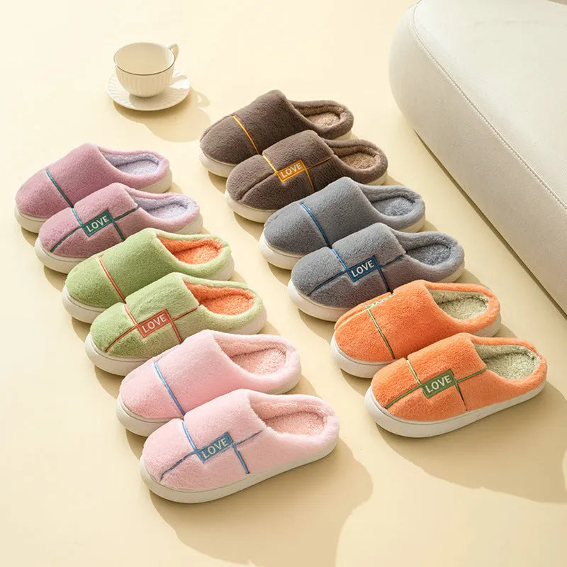 Women's indoor furry slippers in solid colour with plush upper and rubber sole for winter warmth