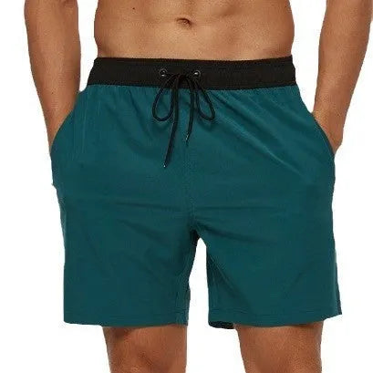 Men's blue stitching waist athletic shorts with a side zip pocket and drawstring