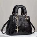 Women's PU crocodile-pattern messenger bag in silver with zip closure, inner pockets, and shoulder strap shown on neutral background