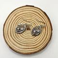 Silver leaf-shaped drop earrings with colourful moonstone centrepieces for women