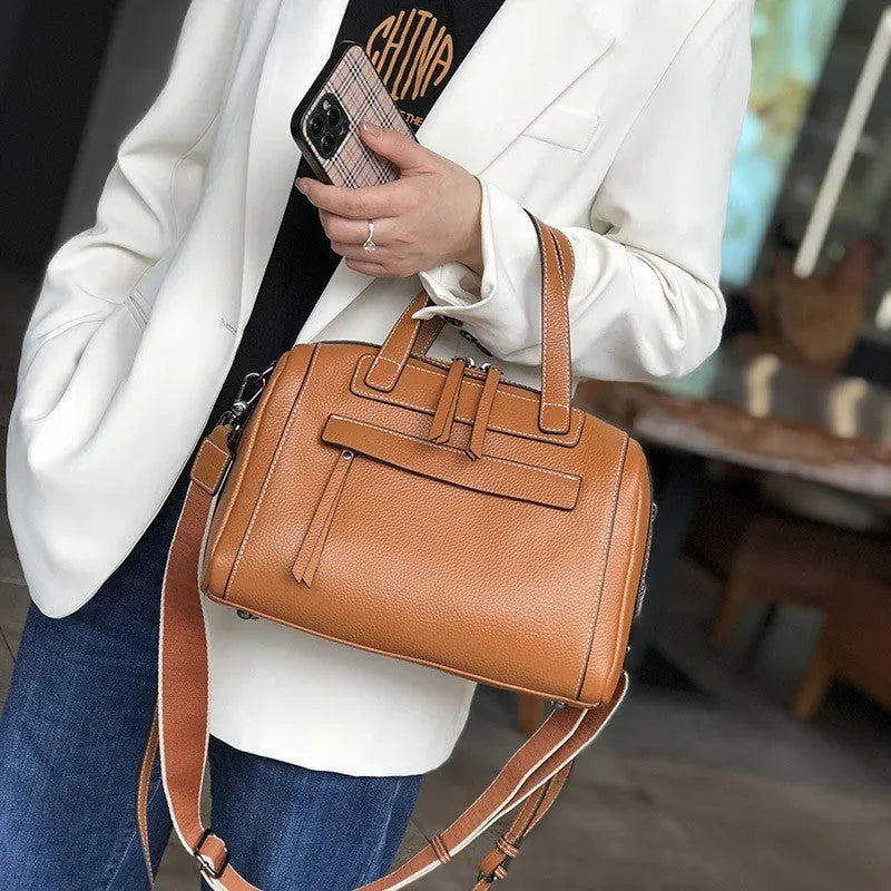 Genuine cowhide leather messenger bag with lychee pattern texture in horizontal square shape showing internal compartments