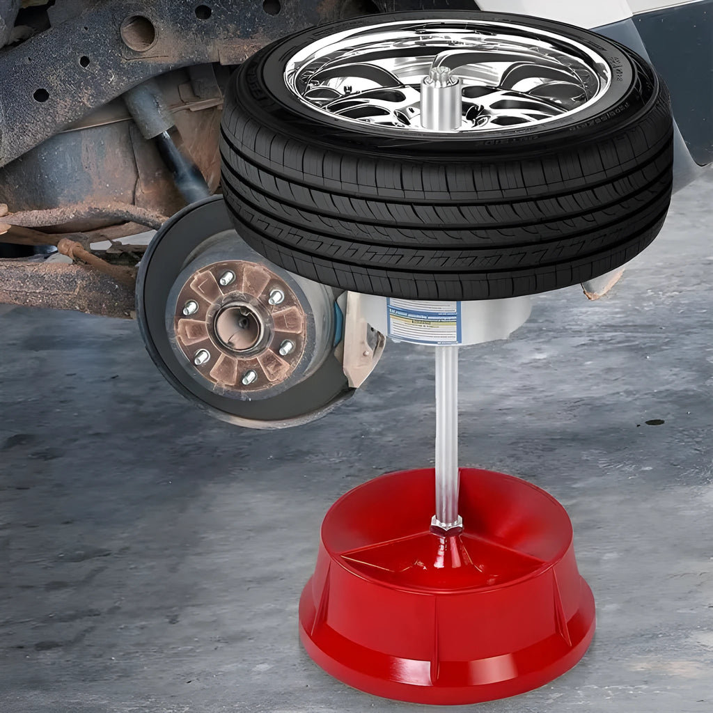 Portable aluminium hub balancer for car tyres with bull's eye level on enamel base.